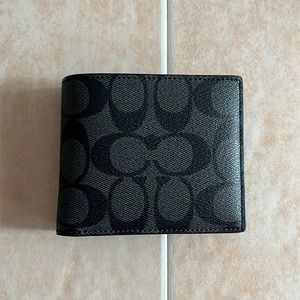 Coach bi-fold wallet.